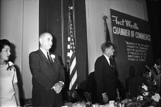Image of President Kennedy and Lyndon B. Johnson at the Fort Worth breakfast