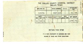 Dallas County Hospital District paystub with handwritten notes about Oswald