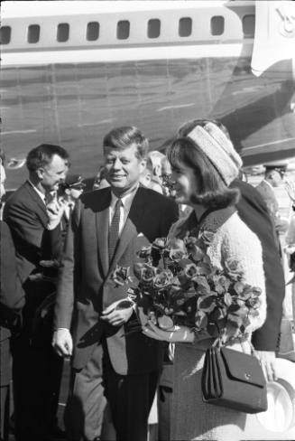 Image of Kennedys walking through receiving line at Love Field