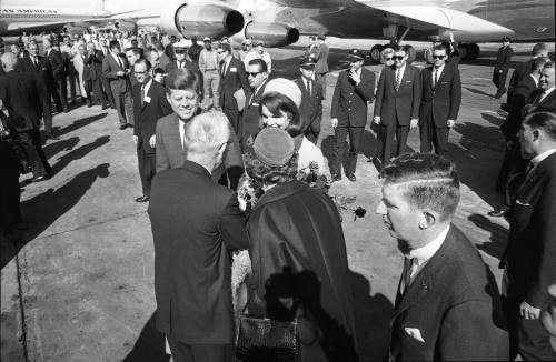 Image of the Kennedys greeting a couple at Dallas Love Field