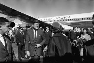 Image of the Kennedys greeting local dignitaries at Love Field