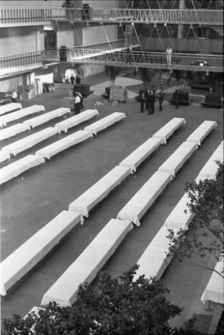 Image of banquet tables being set up at the Dallas Trade Mart