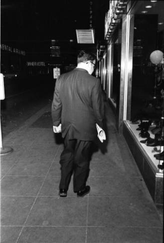Image of unidentified man in downtown Dallas on the evening of November 22, 1963