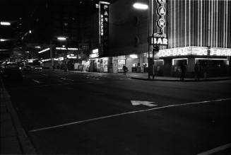 Image of Commerce Street in downtown Dallas the evening of November 22, 1963