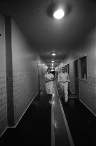 Image of hospital staff in a Parkland Hospital hallway the day Oswald was shot