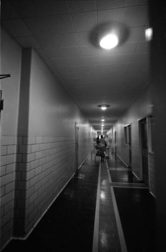Image of hospital staff in a Parkland Hospital hallway the day Oswald was shot