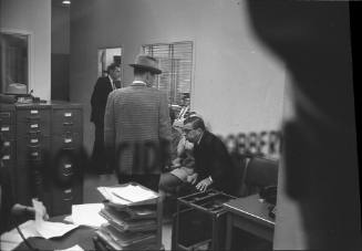 Image of Jack Ruby's sister Eva Grant in the Homicide and Robbery Bureau
