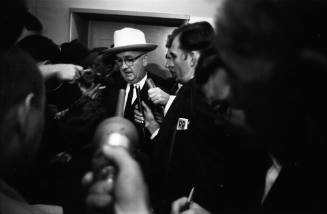 Image of Tom Howard speaking to reporters at the Dallas Police Department