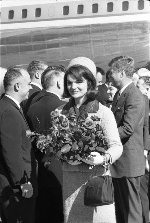 Image of Jacqueline Kennedy greeting local dignitaries at Love Field