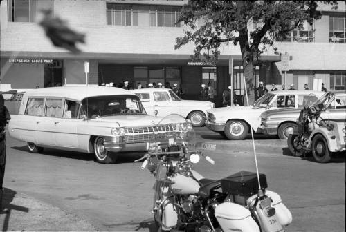 Image of the hearse carrying President Kennedy's body leaving Parkland Hospital
