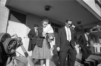 Image of Marina Oswald leaving Parkland Hospital on November 24, 1963