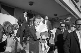 Image of Marina and June Oswald leaving Parkland Hospital