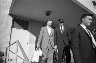 Image of Robert Oswald leaving Parkland Hospital on November 24, 1963