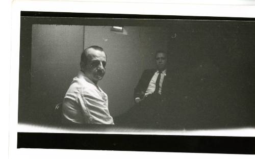 Photograph of Jack Ruby and attorney Phil Burleson in Ruby's jail cell