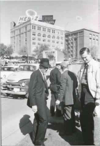 Image from contact sheet of investigators on the south side of Elm Street