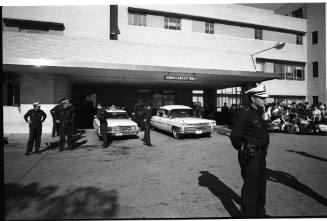 Image of hearse leaving Parkland Hospital on November 22, 1963