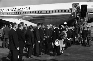 Image of Govenor Connally and the Kennedys greeting dignitaries at Love Field
