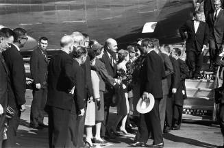 Image of Govenor Connally and Jackie Kennedy greeting dignitaries at Love Field