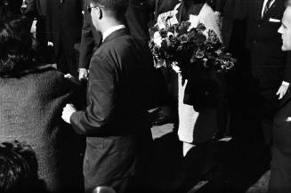 Image of President and Jacqueline Kennedy talking to people at Love Field