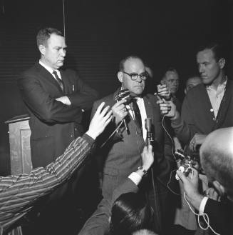 Image of police chief Jesse Curry announcing Oswald's death