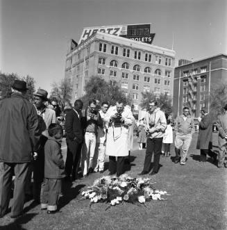 Image of mourners in Dealey Plaza the day after the assassination