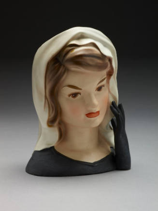 Vase by Inarco meant to look like Jacqueline Kennedy in her mourning veil