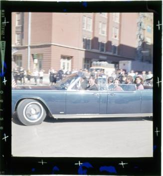 Color slide transparency of presidential limousine in Dealey Plaza - Towner 1