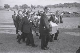 Image of pallbearers carrying Lee Harvey Oswald's casket
