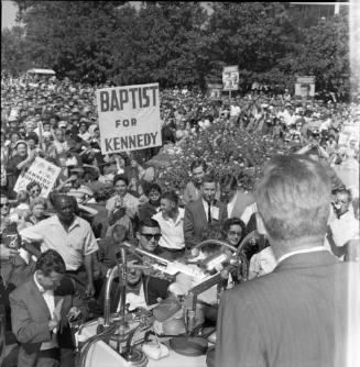 Image of Senator Kennedy speaking to a crowd in Burnett Park in Fort Worth