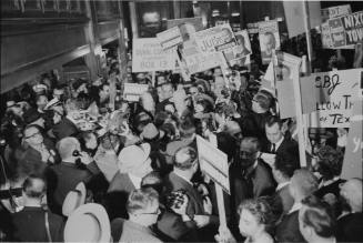 Image of the Johnsons surrounded by Nixon supporters in the Baker Hotel