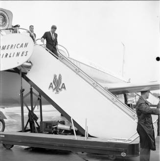 Image of President Kennedy deplaning in Dallas in 1961