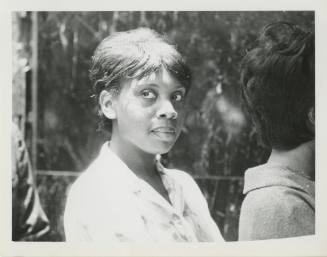 Photograph of a woman at a 1964 Dallas civil rights protest