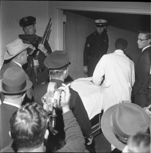 Image of Oswald's body being taken to the Parkland Hospital morgue