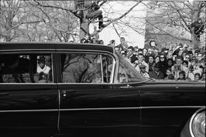 35mm b&w negative of car taking Caroline and John Kennedy, Jr., to the Capitol
