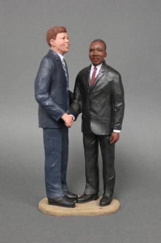 Figurine of John F. Kennedy and Martin Luther King Jr., titled "Racial Harmony"
