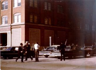 Image of the northwest corner of Elm and Houston Streets in Dealey Plaza