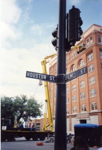 Photograph of a crane in Dealey Plaza during filming of the movie "JFK"