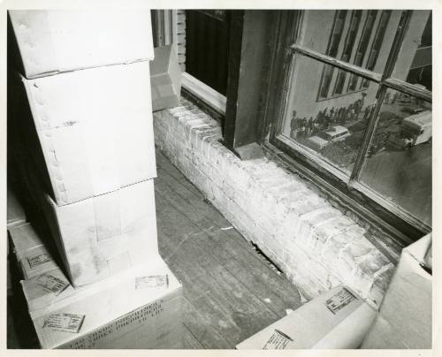 Photograph of spent rifle shells found on the floor