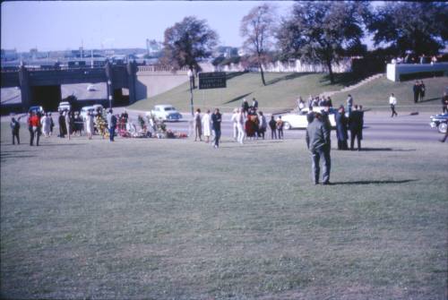 Image of crowds and flowers in Dealey Plaza