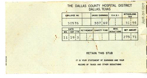 Dallas County Hospital District paystub with handwritten notes about Oswald