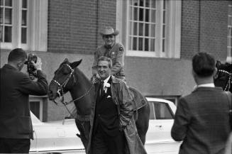 Image of Governor Connally and a horse-mounted deputy sheriff in Fort Worth