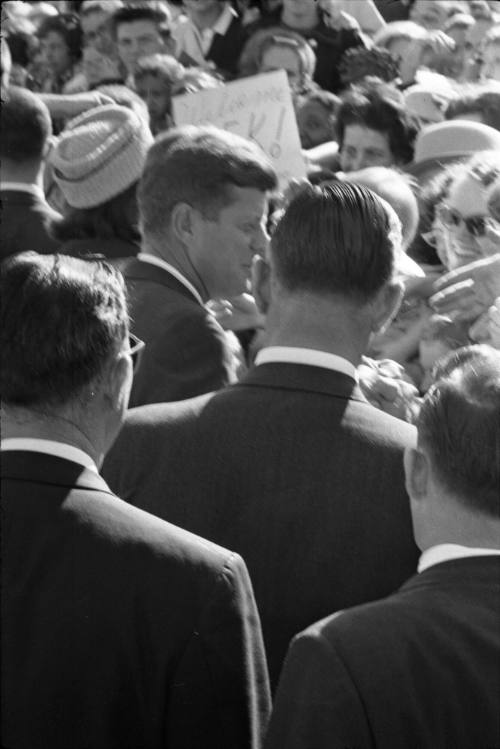 Image of the Kennedys greeting the crowd at Love Field