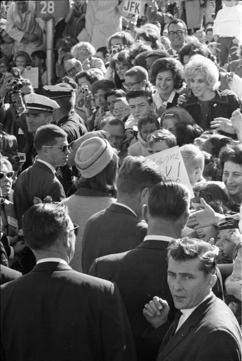 Image of the Kennedys greeting the crowd at Dallas Love Field