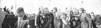 Images of President Kennedy greeting the crowd at Love Field