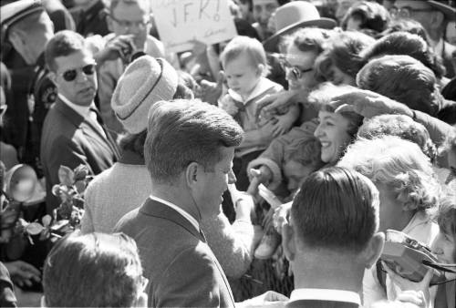 Image of the Kennedys greeting the crowd at Love Field