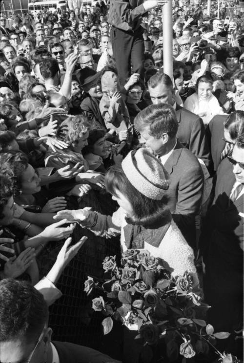 Image of the Kennedys greeting the crowd at Love Field