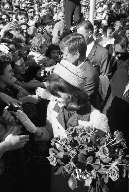 Image of the Kennedys greeting the crowd at Love Field