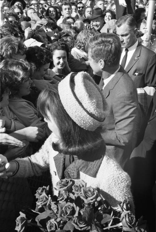 Image of the Kennedys greeting the crowd at Love Field