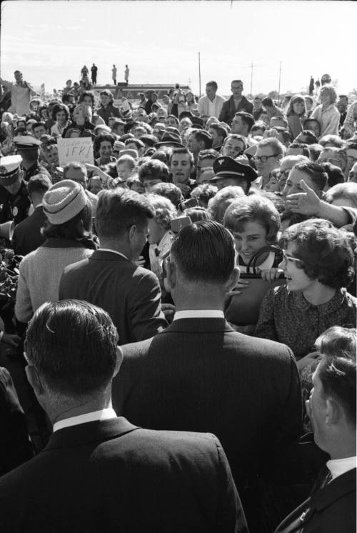 Image of the Kennedys among the crowd at Love Field