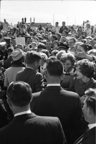 Image of the Kennedys among the crowd at Love Field